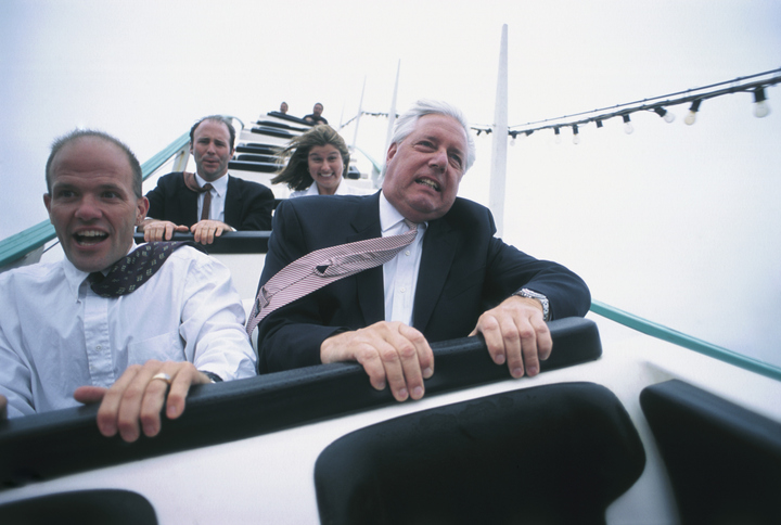 Businessmen on Rollercoaster for article on leadership