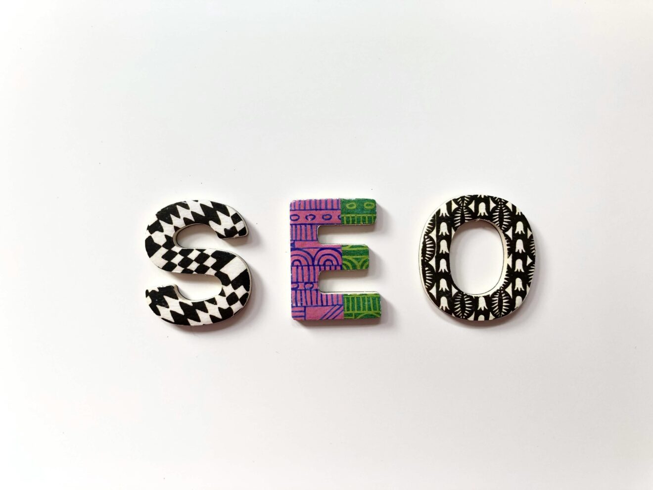 SEO spelled out in Colorful Alphabets For SmartBrief Marketing Oirignal headline: The rise of AI-powered SEO: Friend or foe?