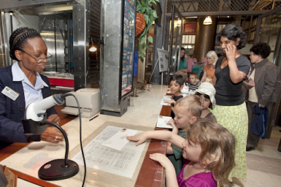 On their field trip at the National Postal Museum, students learn about how the mail keeps us all connected. Here, they are learning how to mail a letter, which they wrote to a friend about their field trip, at the US Post Office on site at the museum. (National Postal Museum)