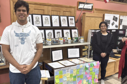 Luis Carlos Chevez and Rachelle Villarreal presented their project idea at the Raven Hill Discovery Center community showcase in East Jordan. Mich. Luis was standing in front of the portraits he drew of the community members the students interviewed. for article on design thinking