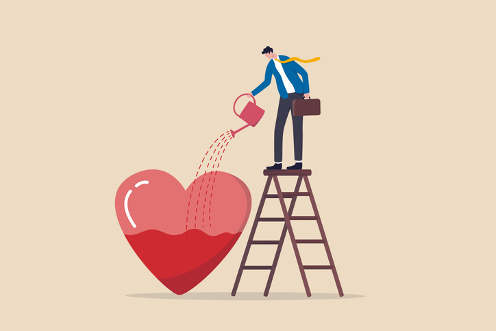 Work passion, motivation to success and win business competition, mindset or attitude to work in we love to do concept, businessman pouring water to fulfill heart shape metaphor of passion.